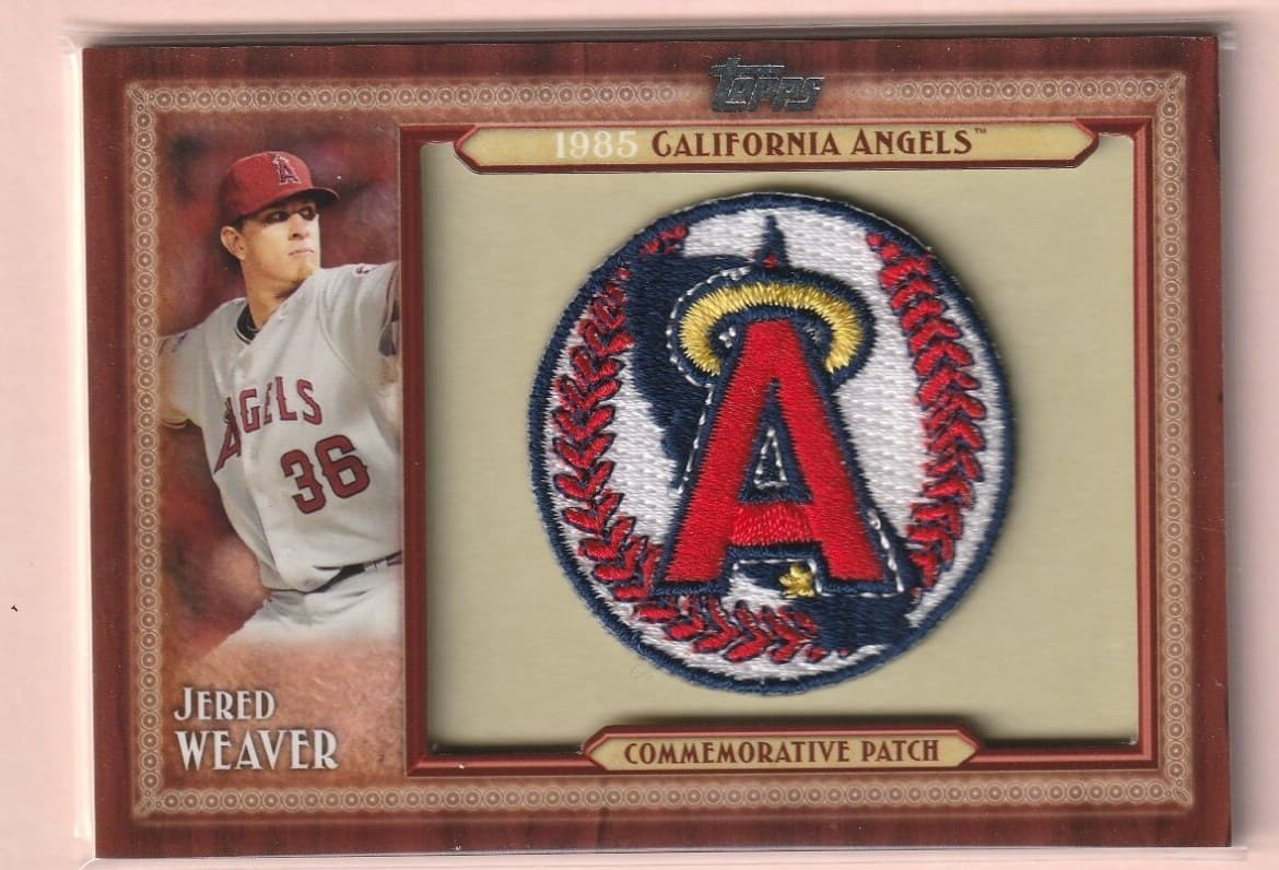 A 2011 Topps Jered Weaver commemorative patch card, a manufactured Los Angeles Angels team logo patch set into the card