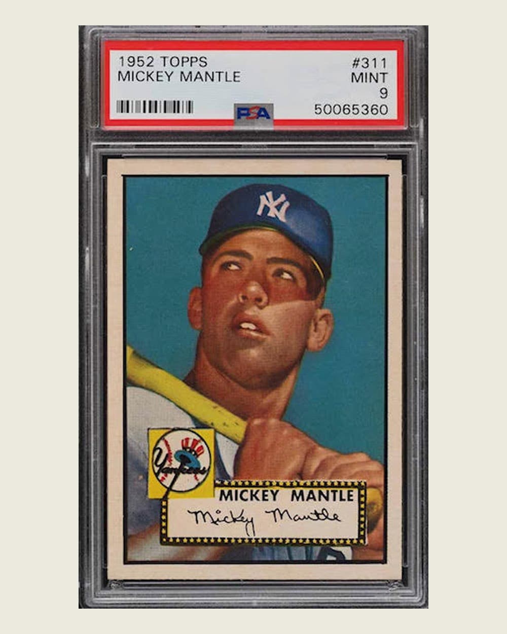 The 1952 Topps Mickey Mantle graded PSA 9 that sold for 5.2 million dollars