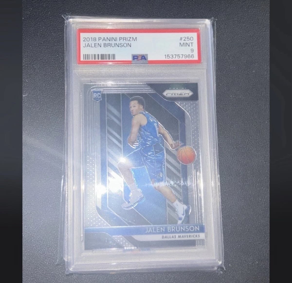 A 2018-19 Panini Prizm Jalen Brunson rookie card, number 250, in a PSA 9 slab