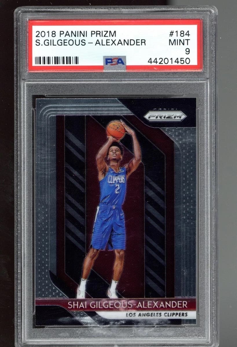 A 2018-19 Panini Prizm Shai Gilgeous-Alexander rookie card, number 184, in a PSA 9 slab