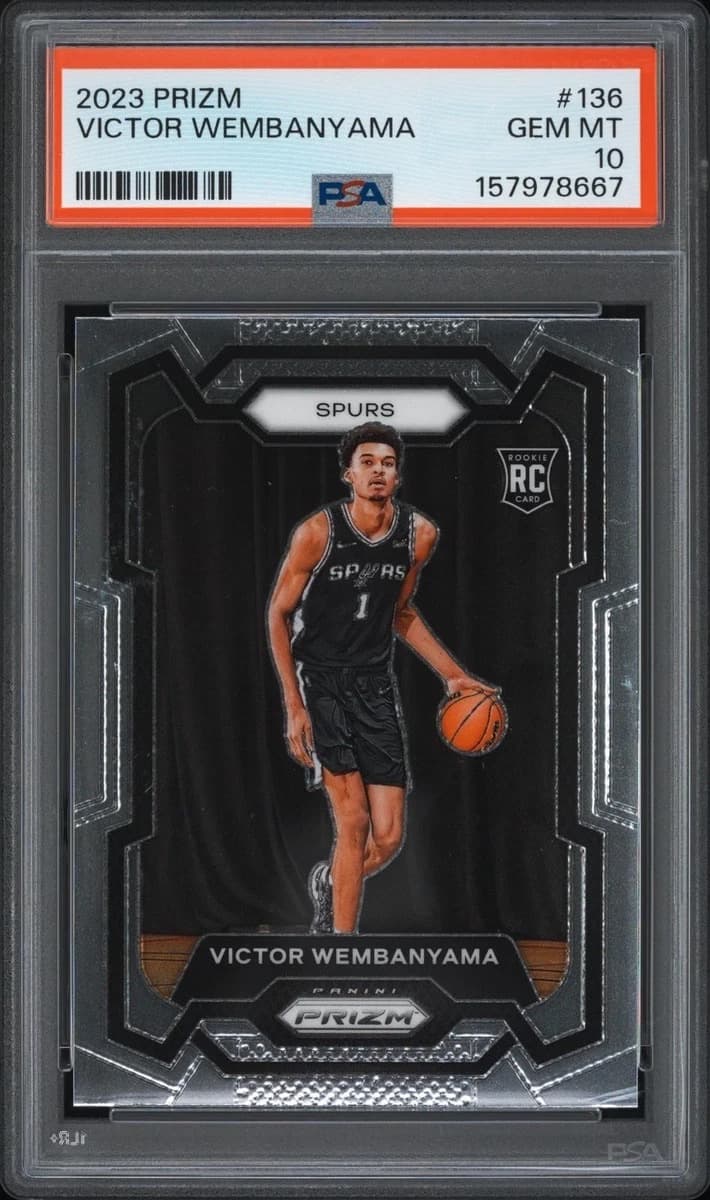 A 2023-24 Panini Prizm Victor Wembanyama rookie card, number 136, in a PSA 10 slab