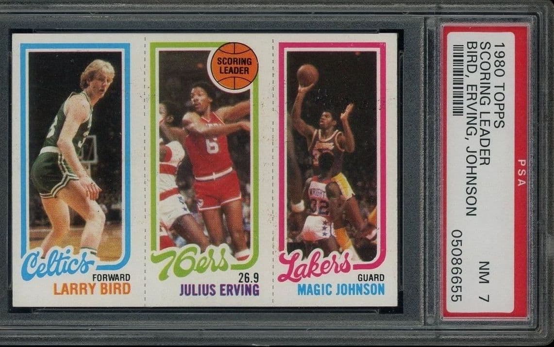 A 1980-81 Topps Larry Bird, Julius Erving and Magic Johnson panel card in a PSA 7 slab