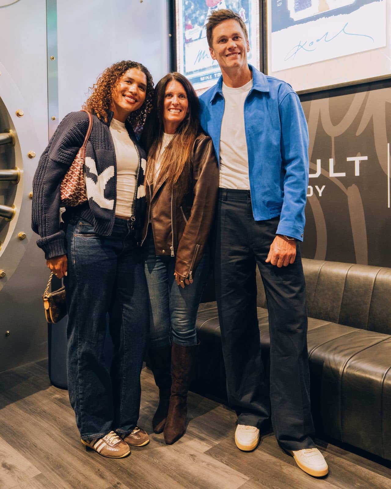 Tom Brady with Maureen Brady and Maya Brady inside the store