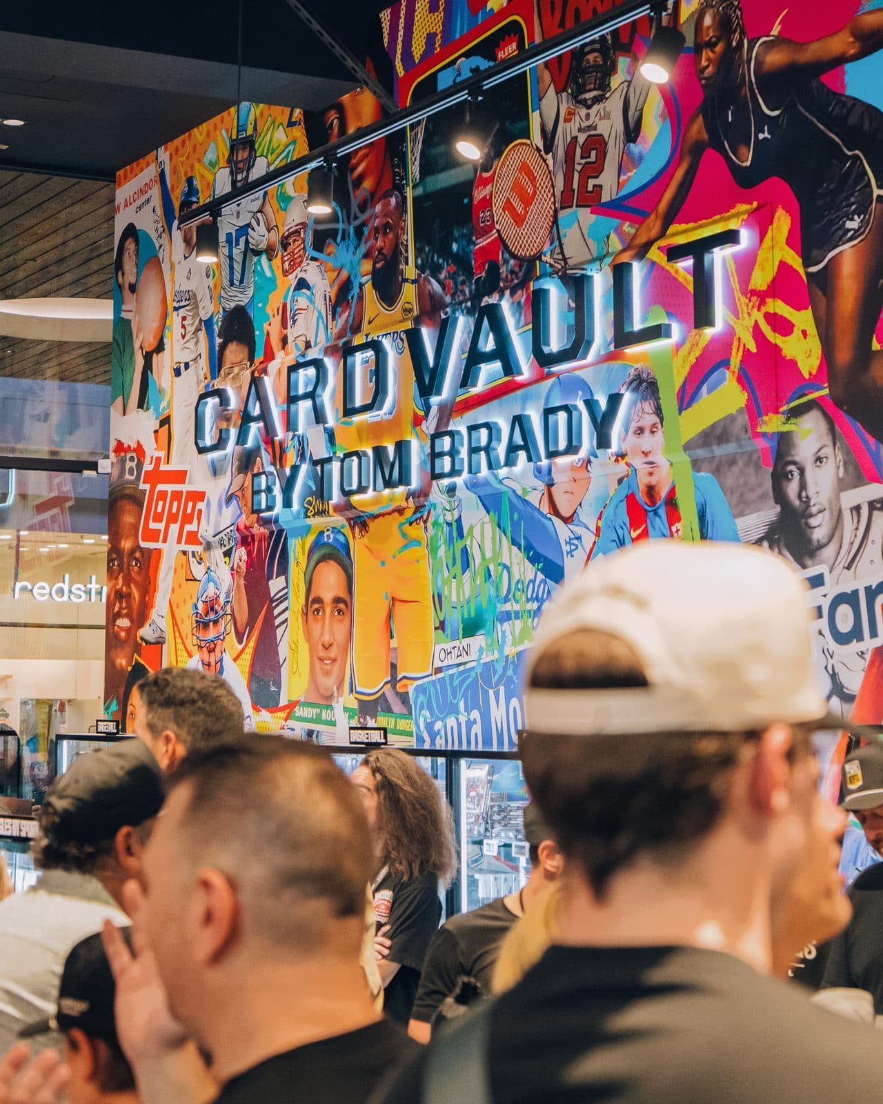 The CardVault by Tom Brady mural wall inside the Century City store