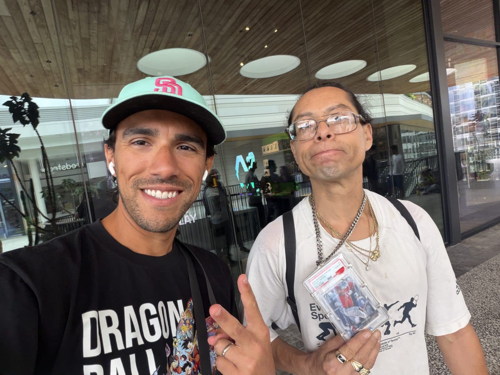 CardWire CEO Jeff Newman and a local collector holding a graded card, in line outside the CardVault by Tom Brady store at Westfield Century City