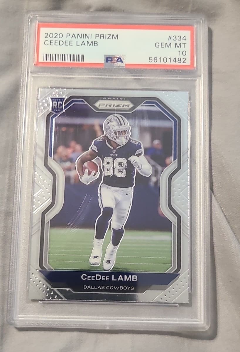 A 2020 Panini Prizm CeeDee Lamb rookie card, number 334, in a PSA 10 slab