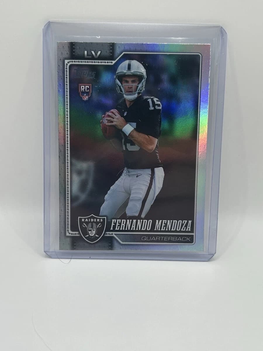 A raw 2026 Topps Fernando Mendoza Rainbow Foil rookie card, number 301, in a top loader