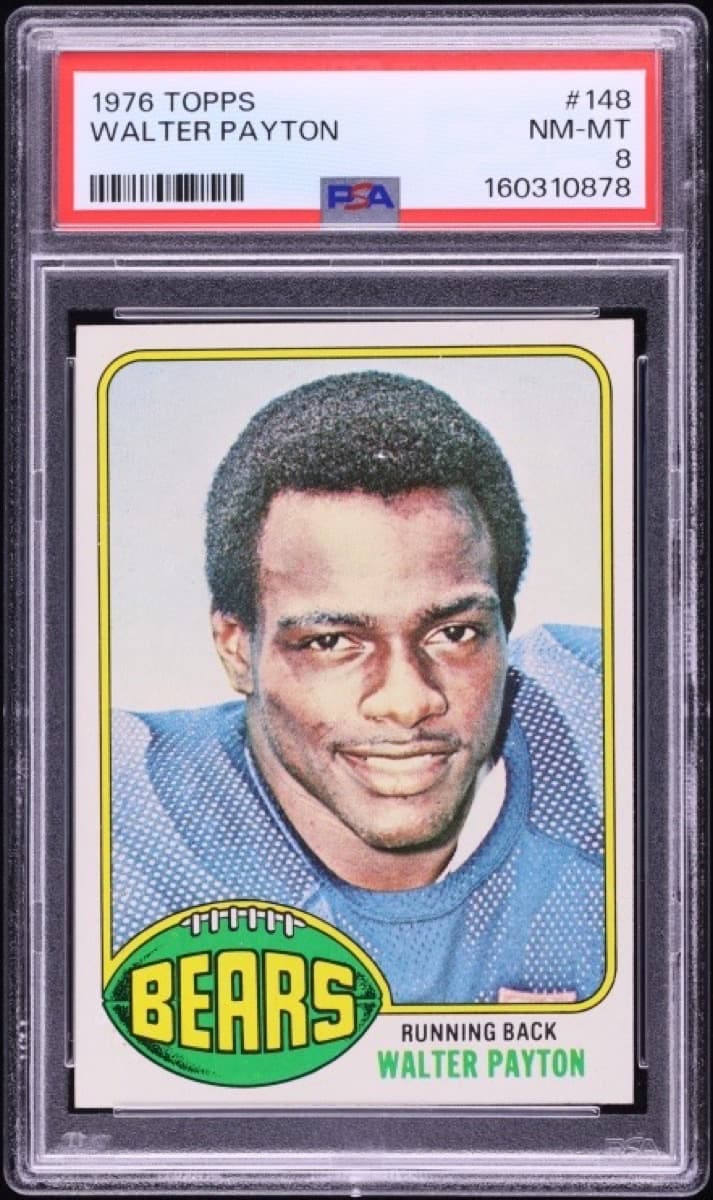 A 1976 Topps Walter Payton rookie card, number 148, in a PSA 8 slab