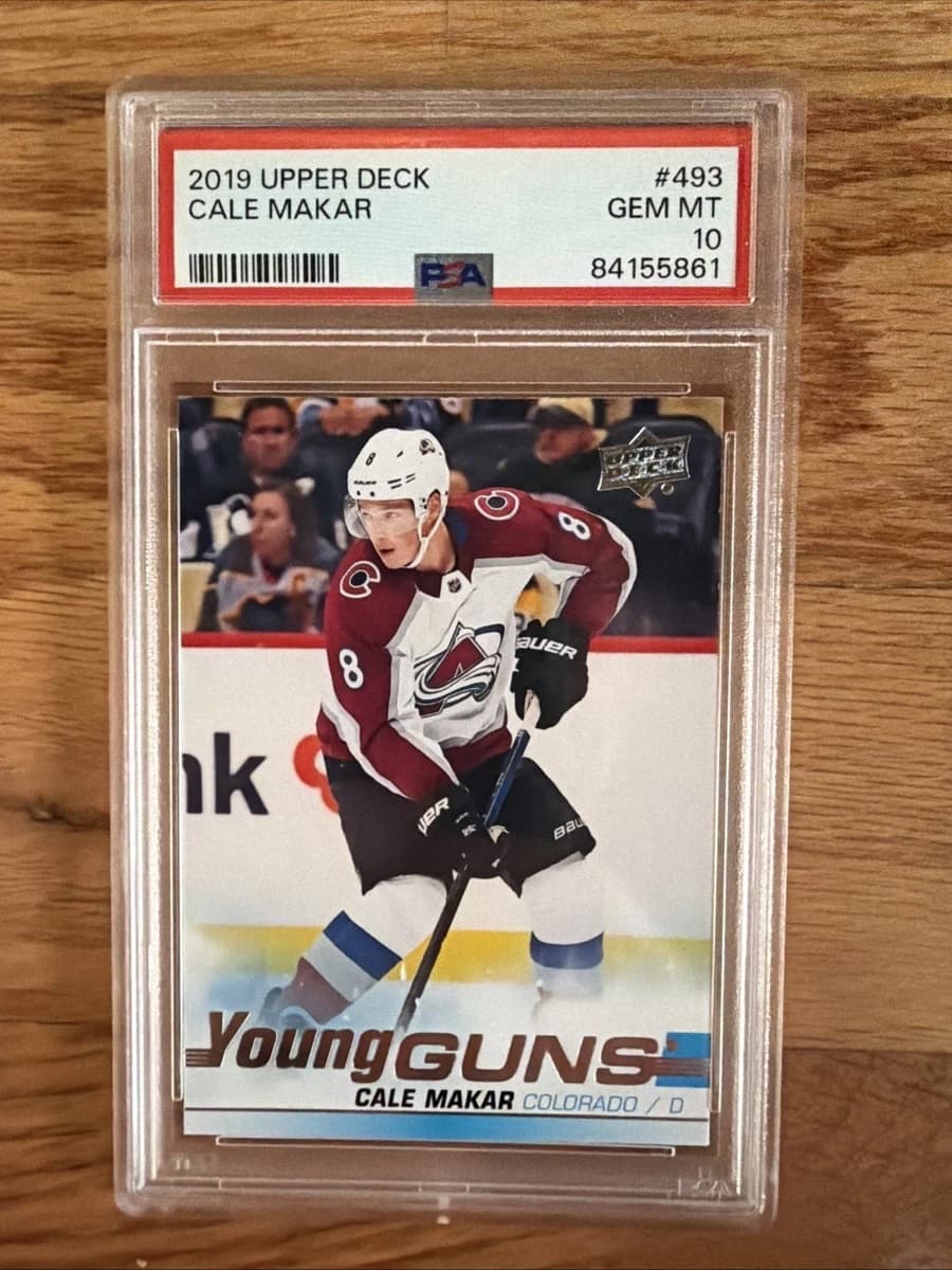 A 2019-20 Upper Deck Young Guns Cale Makar rookie card, number 493, in a PSA 10 slab