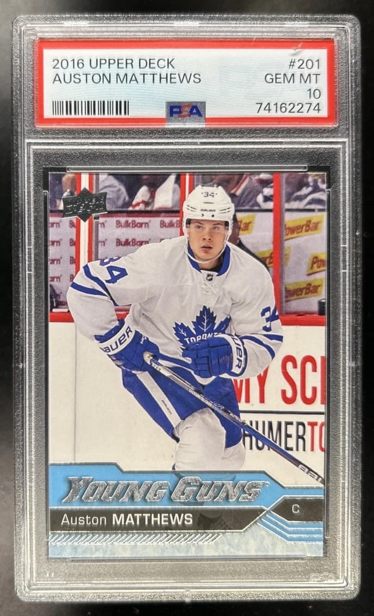 A 2016-17 Upper Deck Young Guns Auston Matthews rookie card, number 201, in a PSA 10 slab