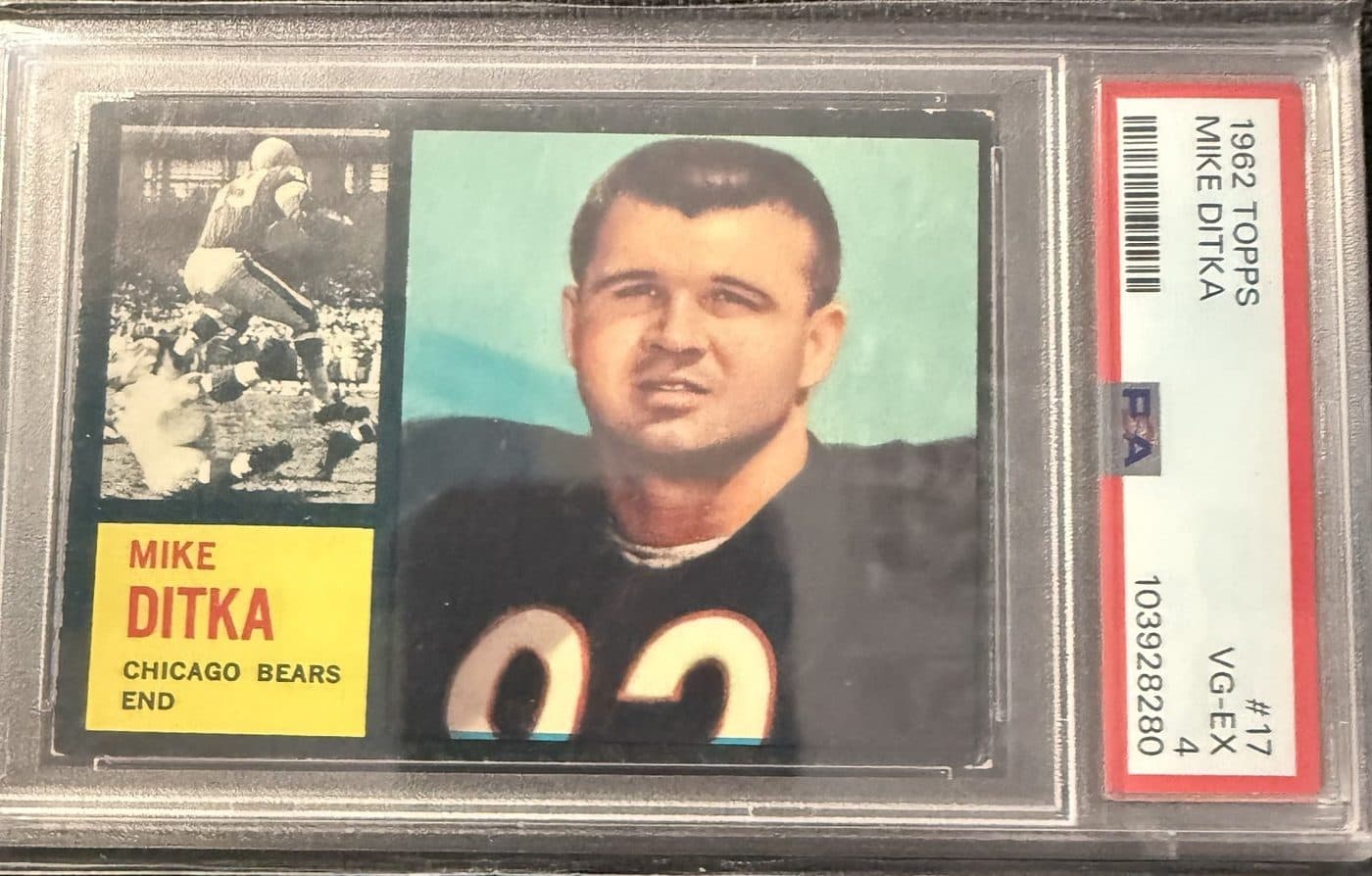 A 1962 Topps Mike Ditka rookie card, number 17, in a PSA 4 slab