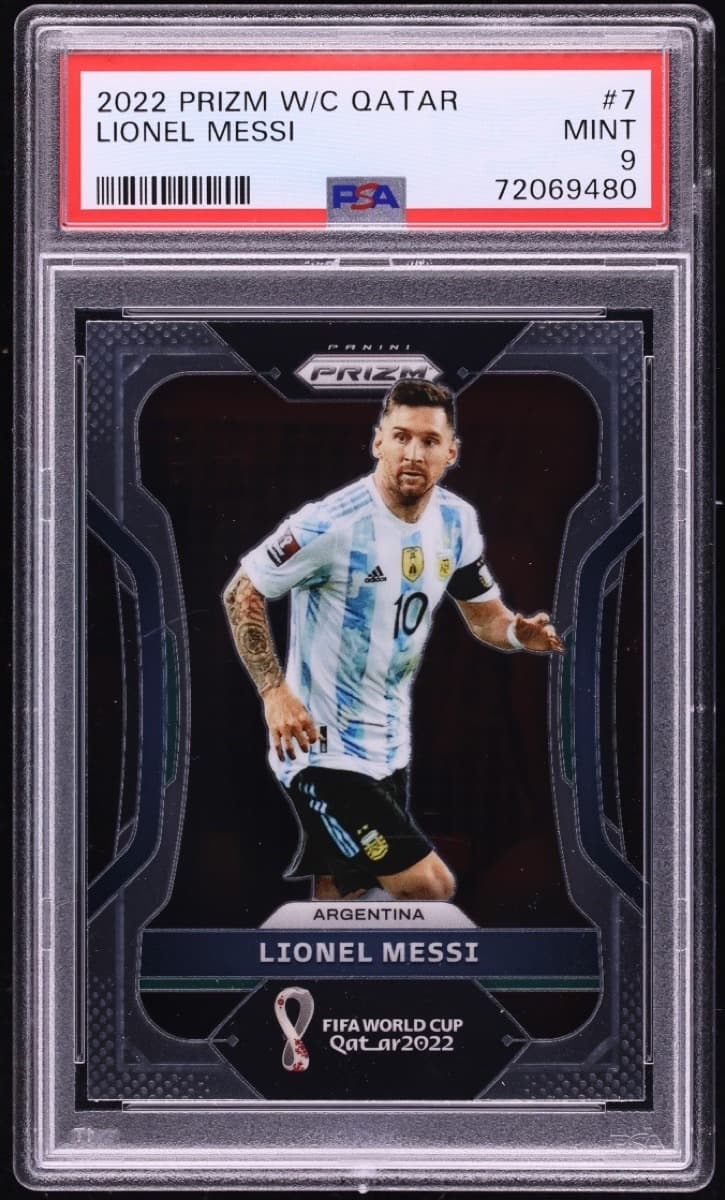 A 2022 Panini Prizm World Cup Qatar Lionel Messi card, number 7, in a PSA 9 slab