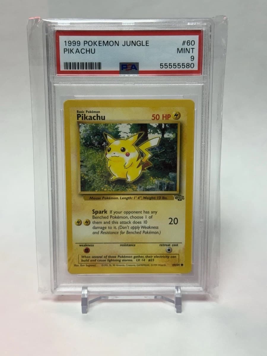 A 1999 Pokémon Jungle Pikachu, number 60, in a PSA 9 slab