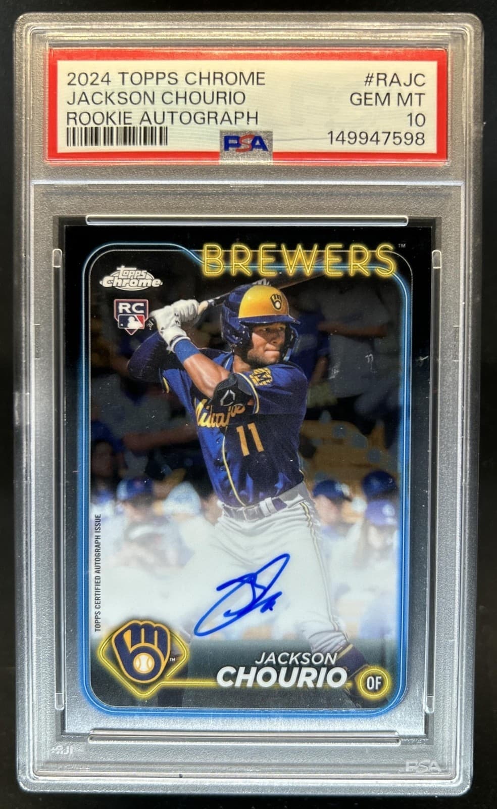 A 2024 Topps Chrome Jackson Chourio rookie autograph, number RA-JC, in a PSA 10 slab