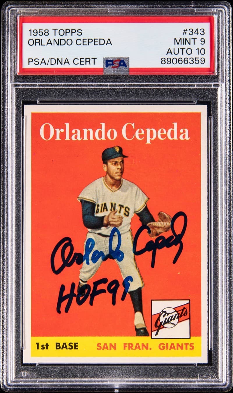 The 1958 Topps #343 Orlando Cepeda rookie, signed and inscribed HOF 99, in a PSA/DNA holder graded Mint 9 with a 10 autograph, cert 89066359. Card image: Goldin lot photo.
