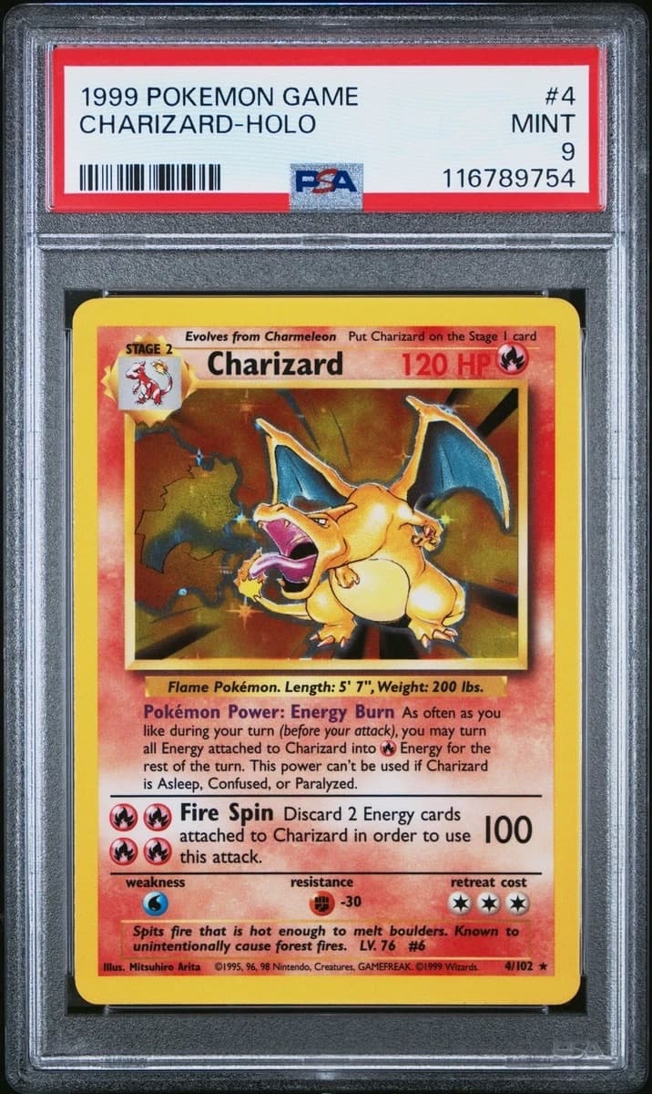 A 1999 Pokémon Base Set Charizard holo, number 4, in a PSA 9 slab