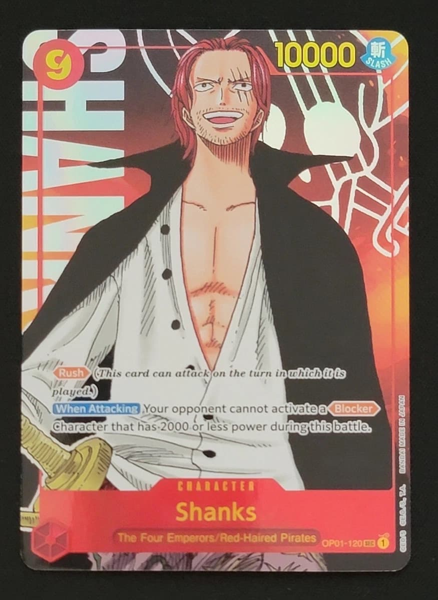 A raw 2022 One Piece Romance Dawn Shanks alternate art, OP01-120