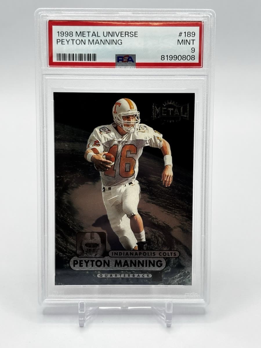 A 1998 Metal Universe Peyton Manning rookie card, number 189, in a PSA 9 slab