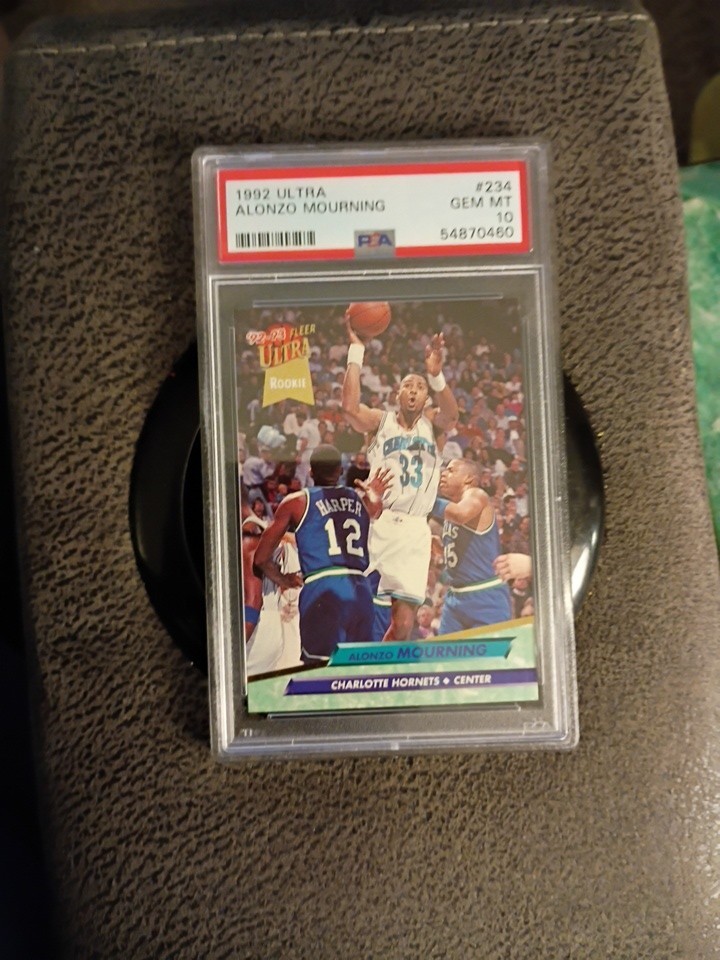 A 1992-93 Fleer Ultra Alonzo Mourning rookie card graded PSA 10 Gem Mint, sealed in its holder