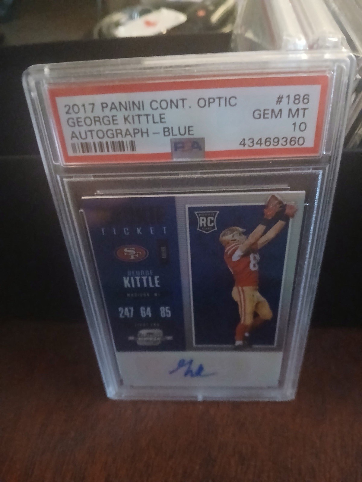 George Kittle 2017 Panini Contenders Optic #186 rookie autograph, Blue /25, PSA 10. Photo: eBay listing.