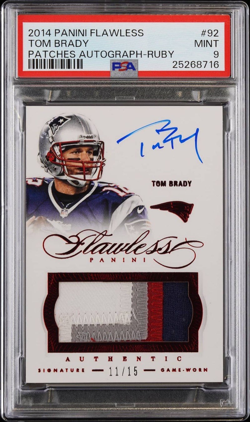 Tom Brady 2014 Panini Flawless Patches Autographs Ruby #92, 11/15, PSA 9, the lot itself. Photo: Goldin.