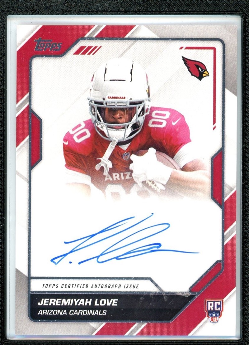 The card image is illustrative. Topps named a draft-day autograph with no listing CardWire could cite, so the picture is a 2026 Topps Flagship Jeremiyah Love First Signatures on-card rookie autograph from a live eBay listing. eBay listing photo, via CardSight.